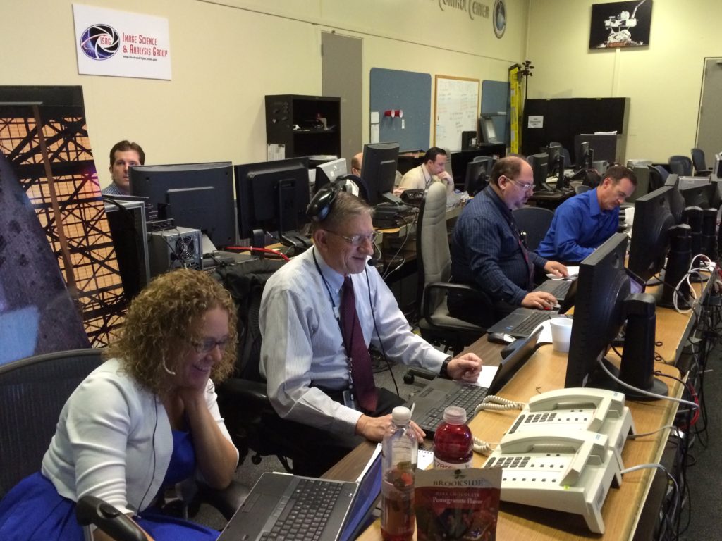 Hard at work in Mission Control at JSC