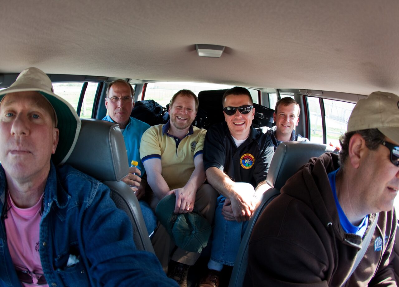 Members of the team carpooling