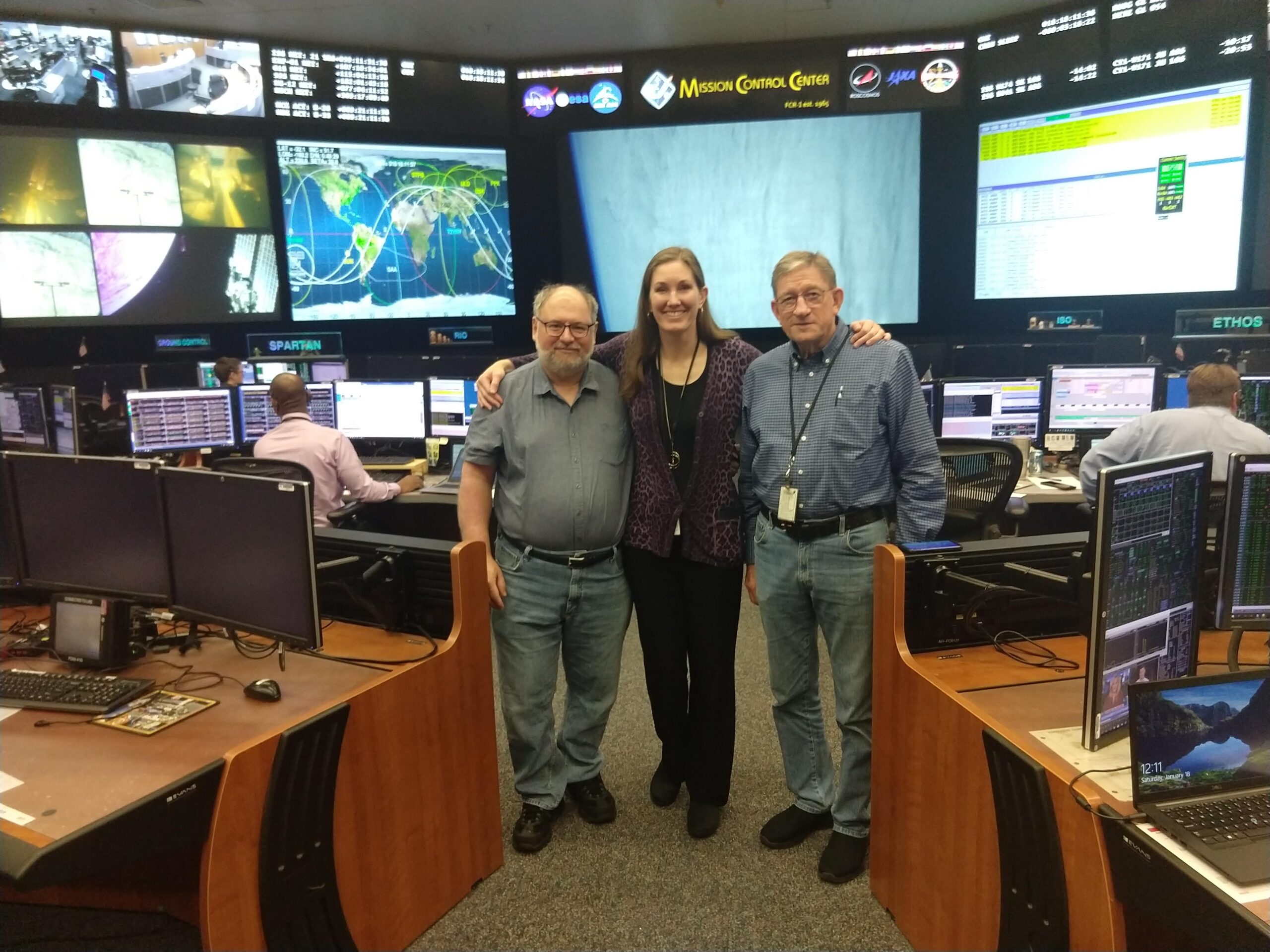 IMG_20200118_121138266 Project manager Jennifer Inman, aircraft mission coordinator Harry Verstynen, and technical lead Rich Schwartz pose in mission control center.