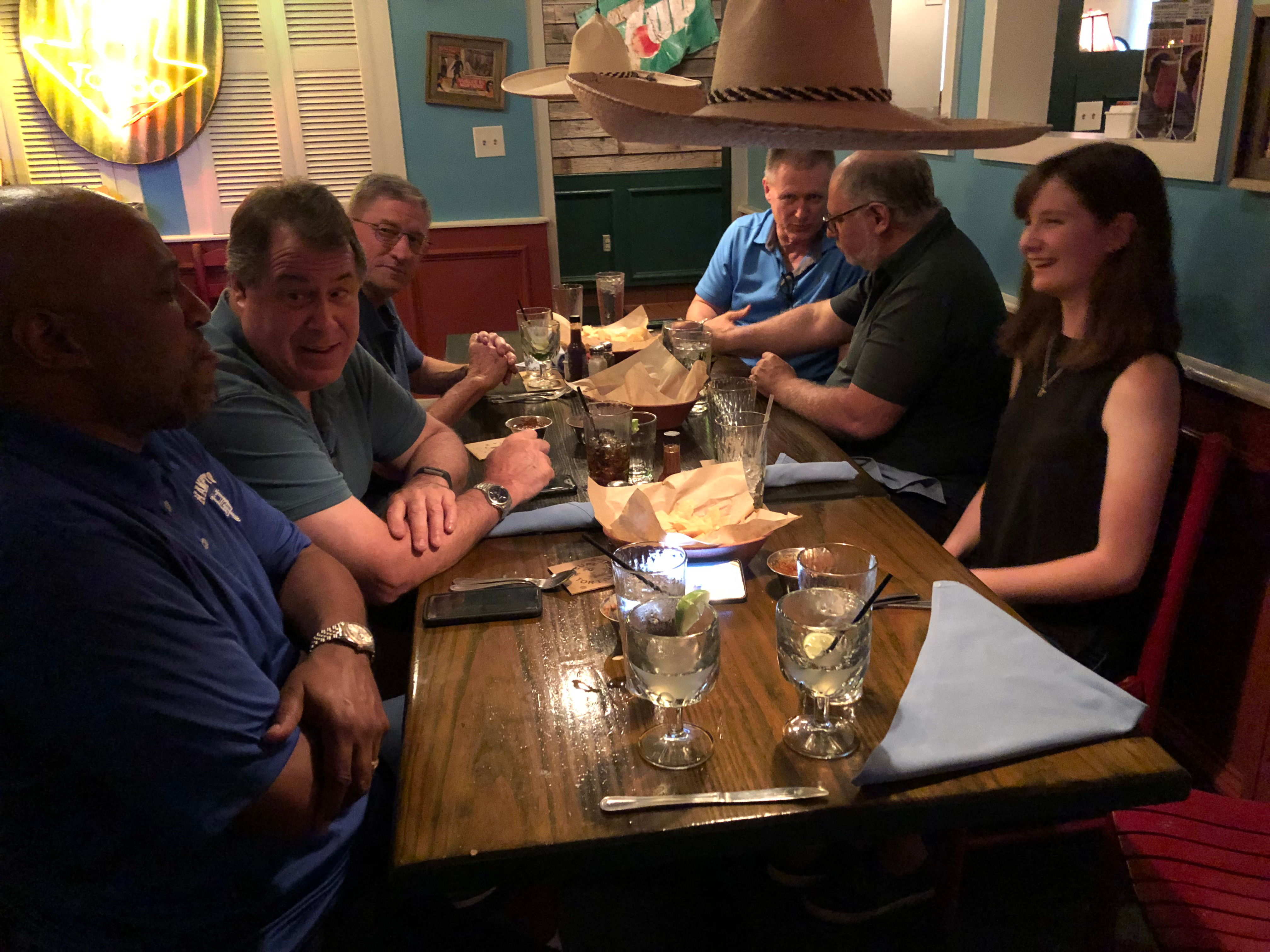 dinner SCIFLI team The SCIFLI team eats dinner together, laughing in converstation.